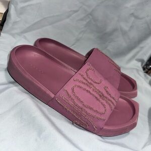 Nike Jordan Nola sliders in light mulberry